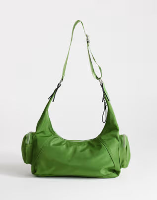 Green curved fabric crossbody bag